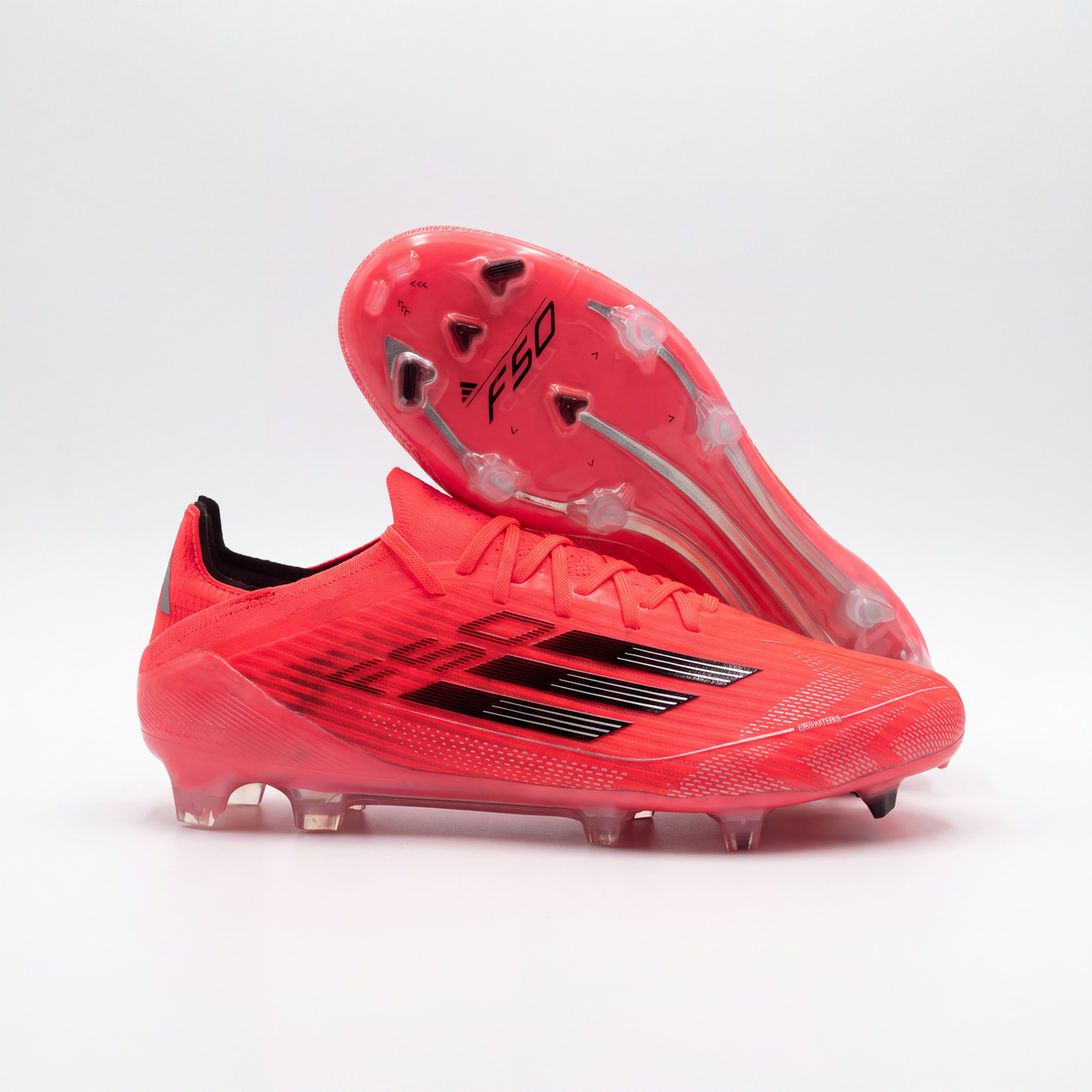 CRAMPONS F50 ELITE FG ORANGE