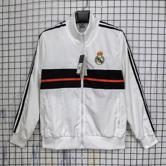 VESTE REAL MADRID COUPE-VENT 25/26 BLANC