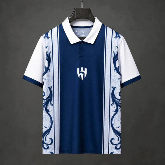 MAILLOT AL HILAL ÉDITION SPÉCIALE 26/27 POLO FLORAL BLEU MARINE