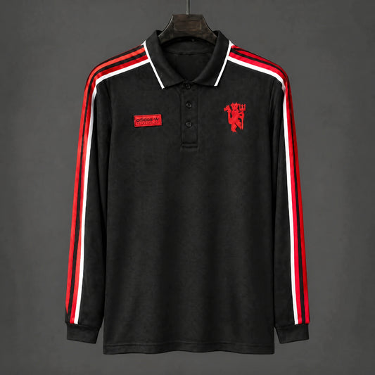 MAILLOT MANCHES LONGUES MANCHESTER UNITED 26/27 SPEZIAL POLO NOIR