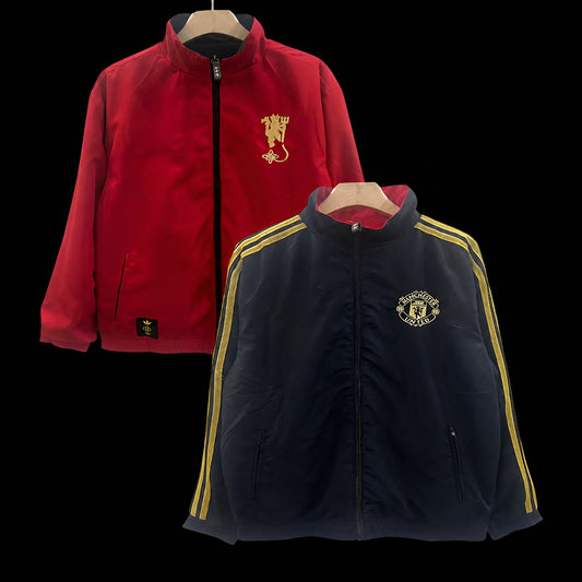 VESTE MANCHESTER UNITED COUPE-VENT 25/26 RÉVERSIBLE ROUGE ET NOIR